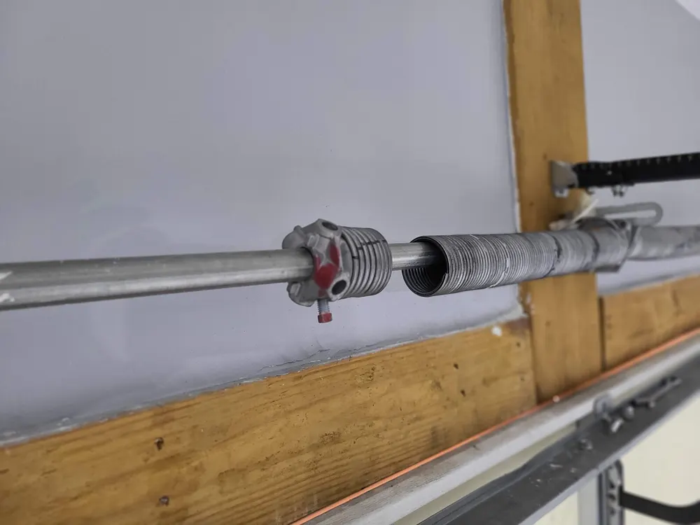 Broken garage door torsion spring replaced by iFix
